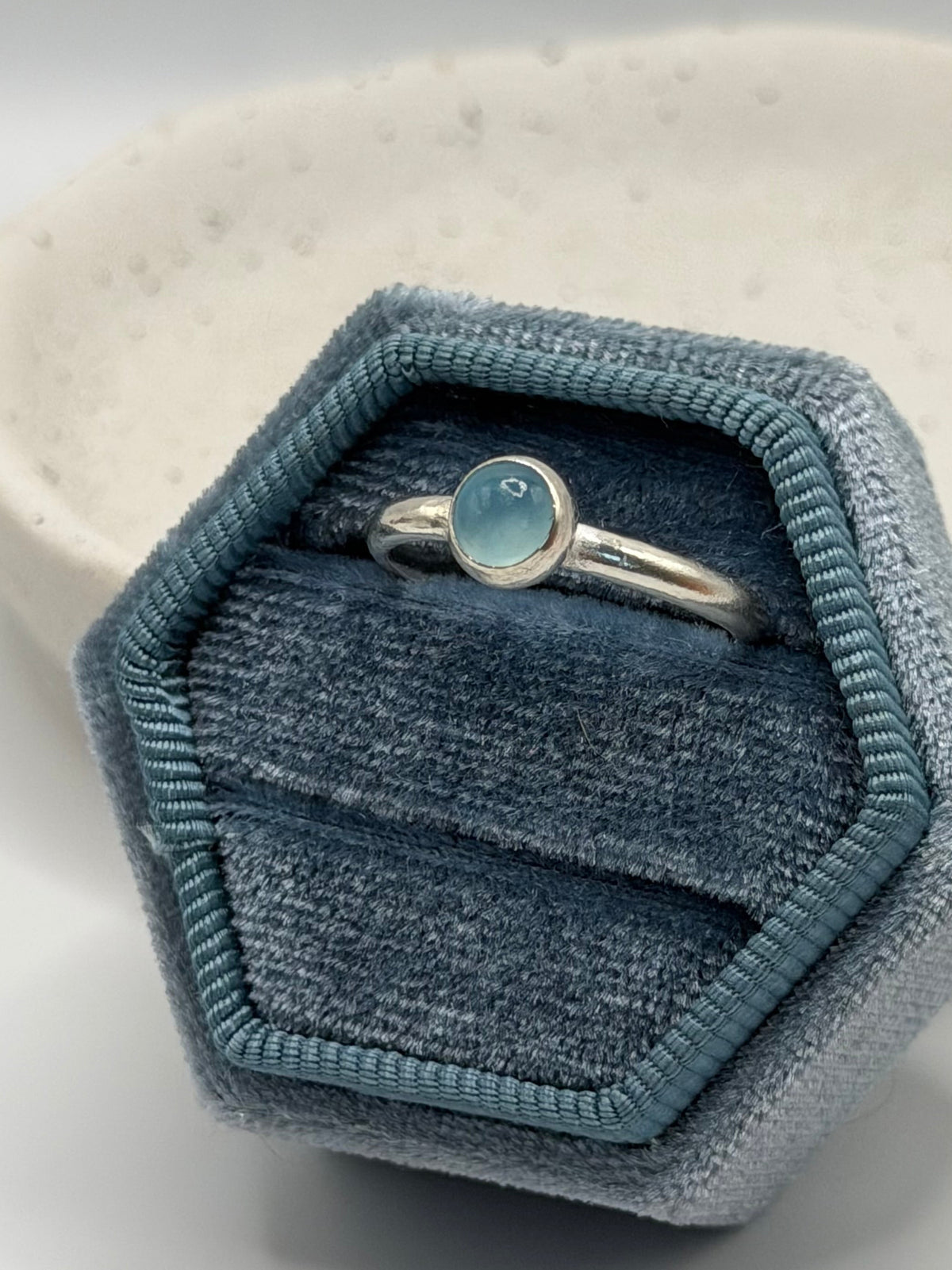 One-of-a-kind round blue chalcedony ring from the Stone + Silver collection by Wild One Jewellery, featuring a smooth blue gemstone cabochon set on a simple sterling silver band.