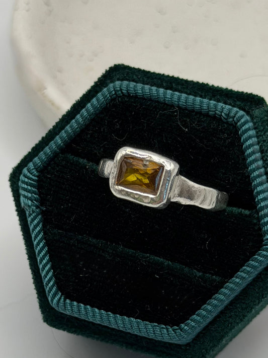 One-of-a-kind 999 fine silver ring handcrafted from silver metal clay, featuring a smoky-coloured cubic zirconia gemstone, part of the Stone + Silver collection by Wild One Jewellery.