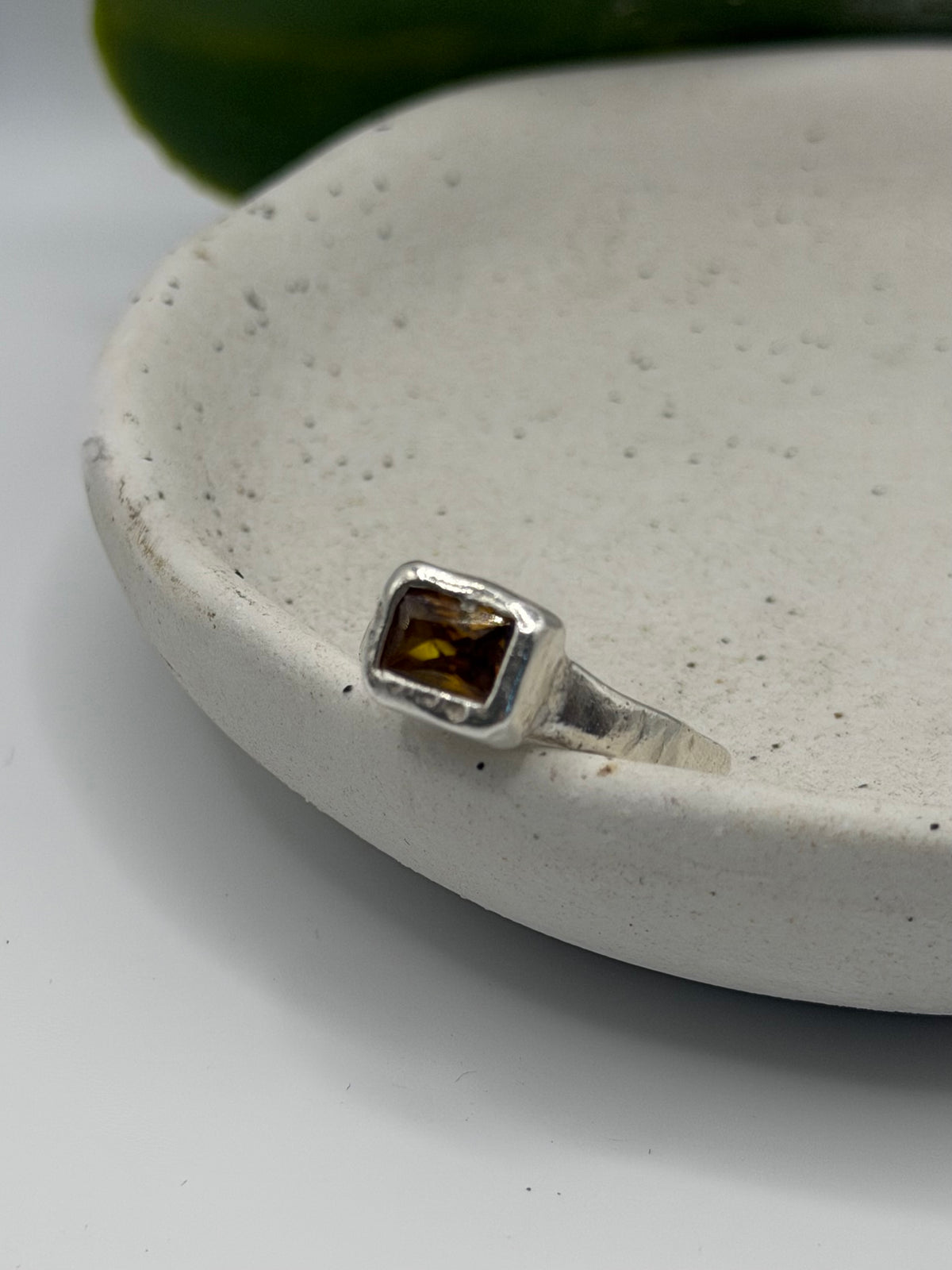 One-of-a-kind 999 fine silver ring handcrafted from silver metal clay, featuring a smoky-coloured cubic zirconia gemstone, part of the Stone + Silver collection by Wild One Jewellery.