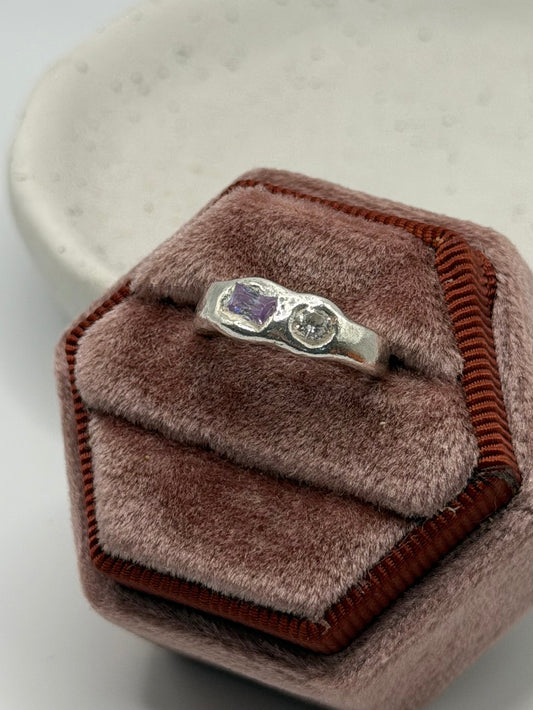 One-of-a-kind 999 fine silver ring from the Stone + Silver collection, featuring lavender-coloured and clear cubic zirconia gemstones set in a handcrafted design.