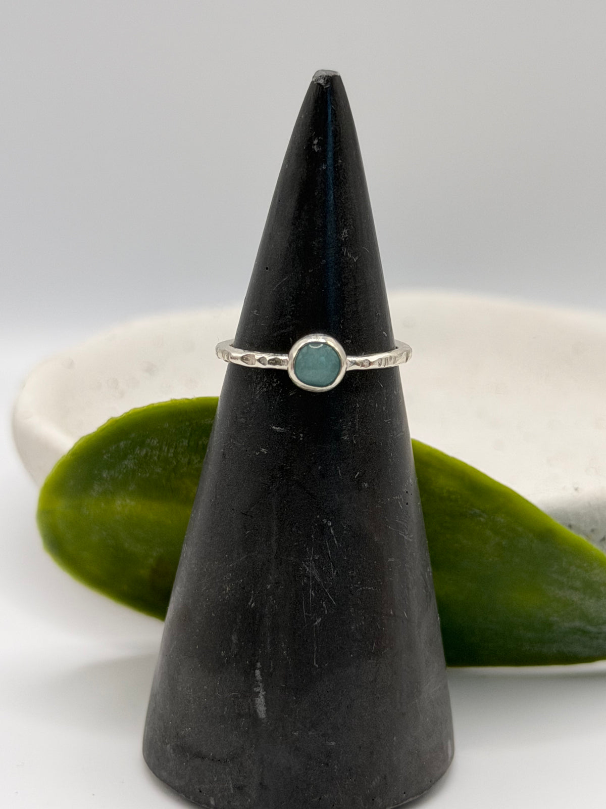 One-of-a-kind oval amazonite ring from the Stone + Silver collection by Wild One Jewellery, featuring a blue-green amazonite cabochon with natural markings set in a sterling silver band.
