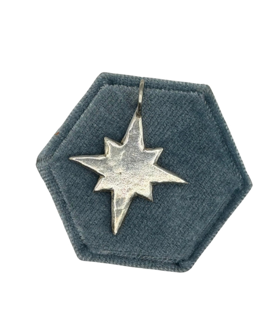 Handmade maxi pole star charm crafted from 999 fine silver metal clay by Wild One Jewellery, featuring an organic shape and textured celestial detailing.