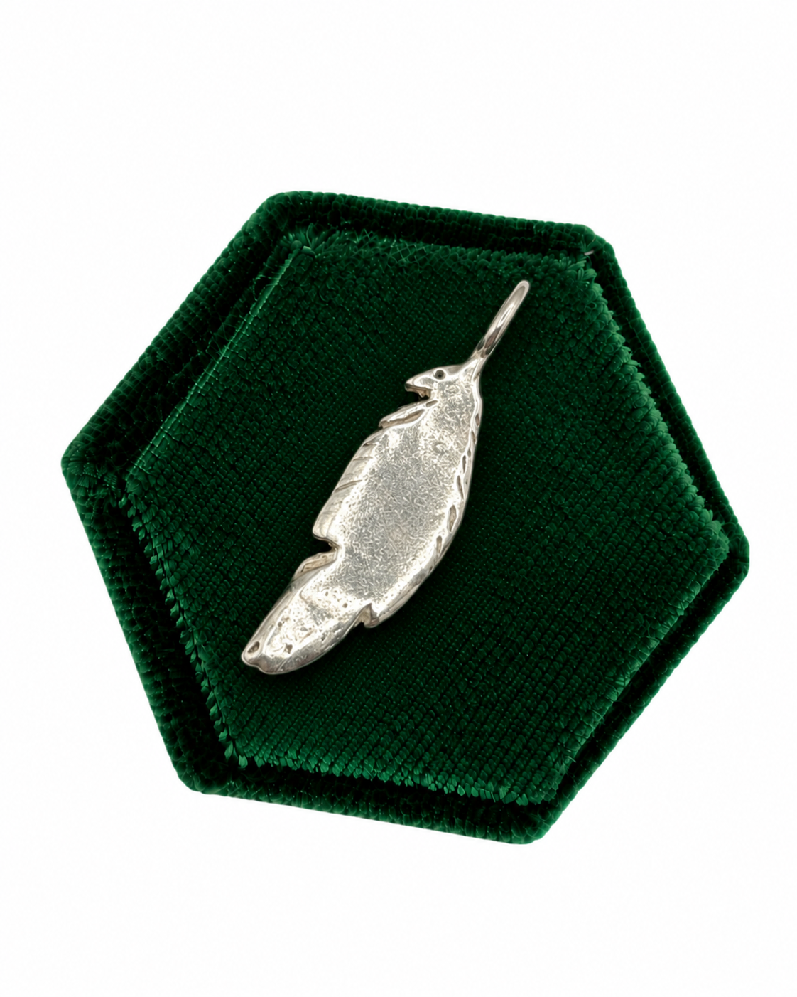Handmade maxi feather charm crafted from 999 fine silver metal clay by Wild One Jewellery, an independent jewellery brand in Lincolnshire, UK. Nature-inspired silver pendant with intricate feather detailing
