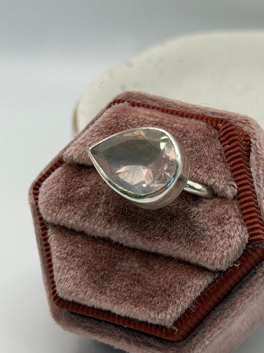 Image alt text: One-of-a-kind statement rose quartz ring from the Stone + Silver collection, featuring a large faceted blush-pink gemstone set in a sterling silver band.