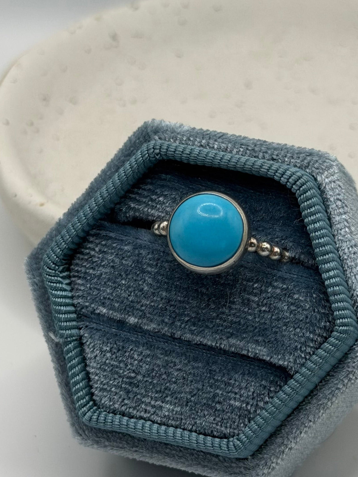 One-of-a-kind turquoise bobble ring from the Stone + Silver collection by Wild One Jewellery, featuring a turquoise cabochon set in a sterling silver band with decorative silver bobble details.